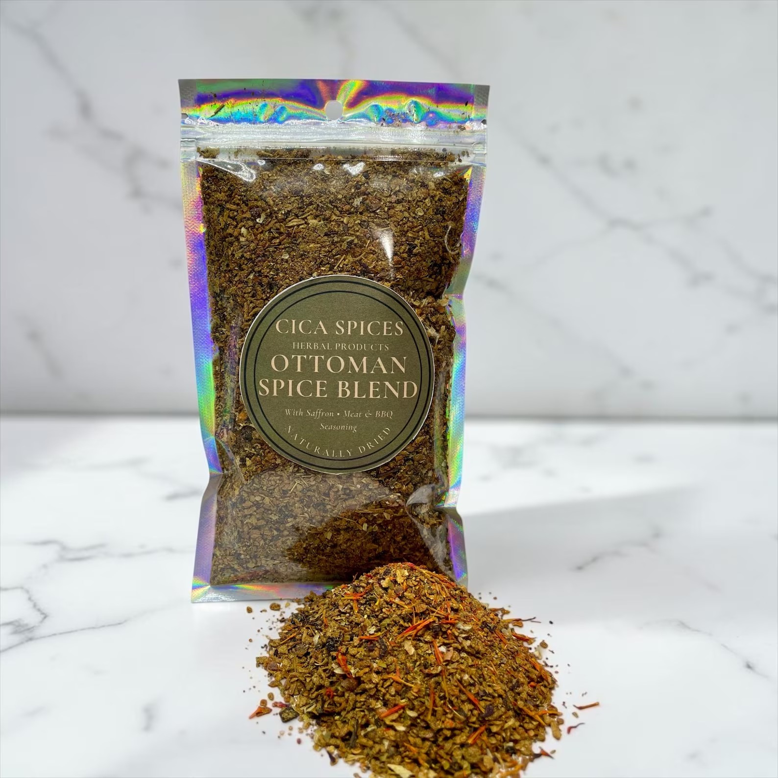 Pouch of Ottoman-style spice blend with saffron threads and a scattered mound